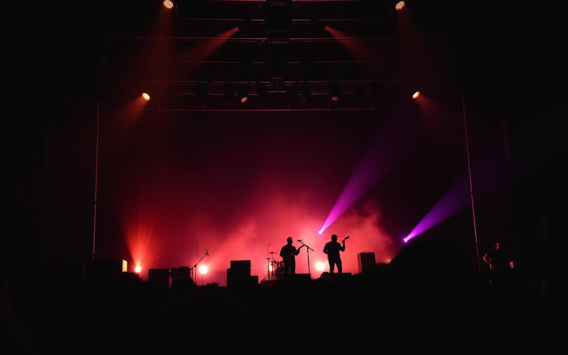 Live concert stage with cinematic lighting